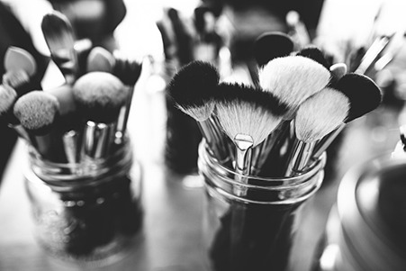 makeup brushes in jars